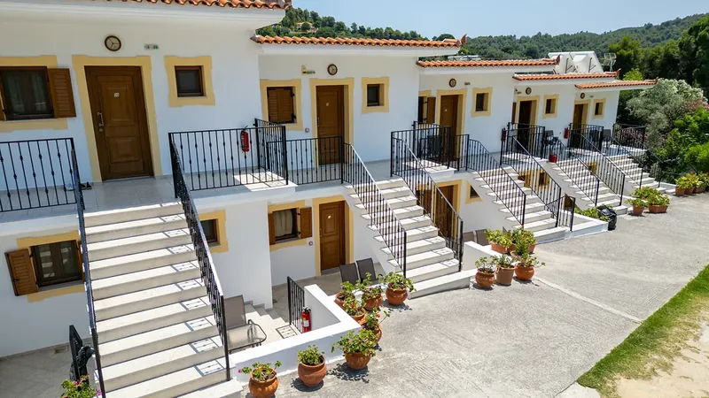 The apartment balconies and steps from the air