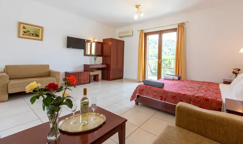 An apartment with roses on the table