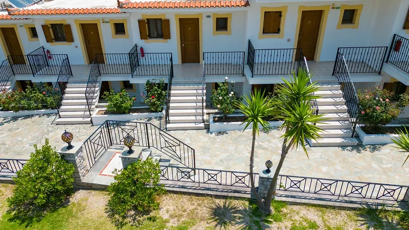The front of the apartments and their stairs from the air