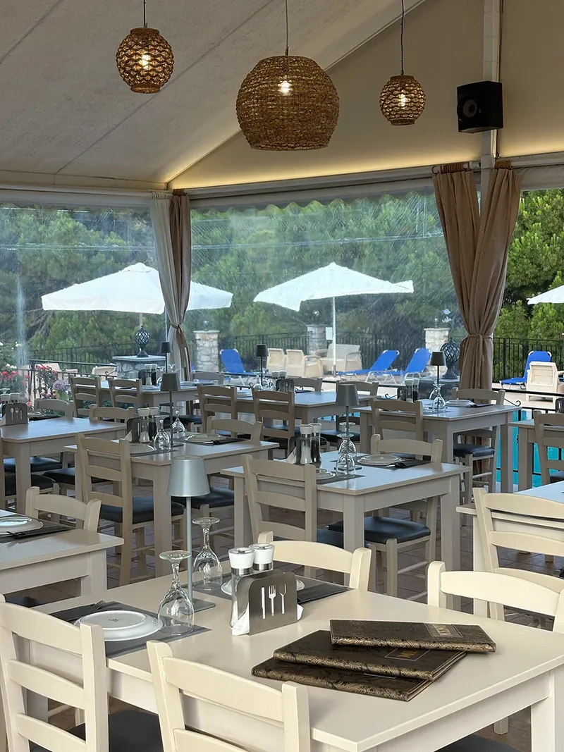 Tables under wicker lanterns